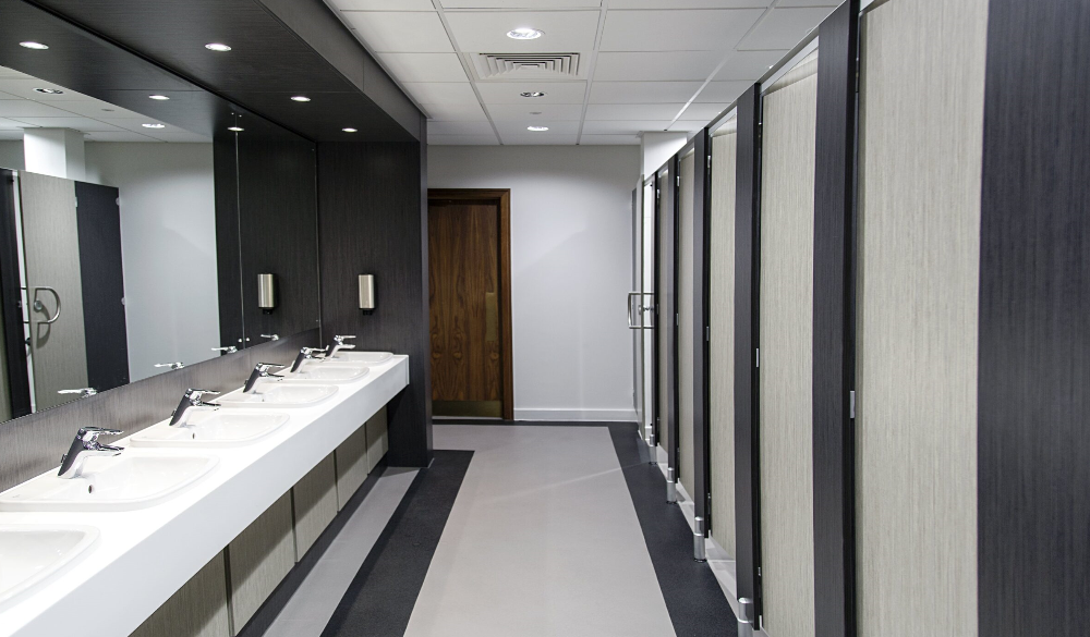 clean washroom with cubicles. 