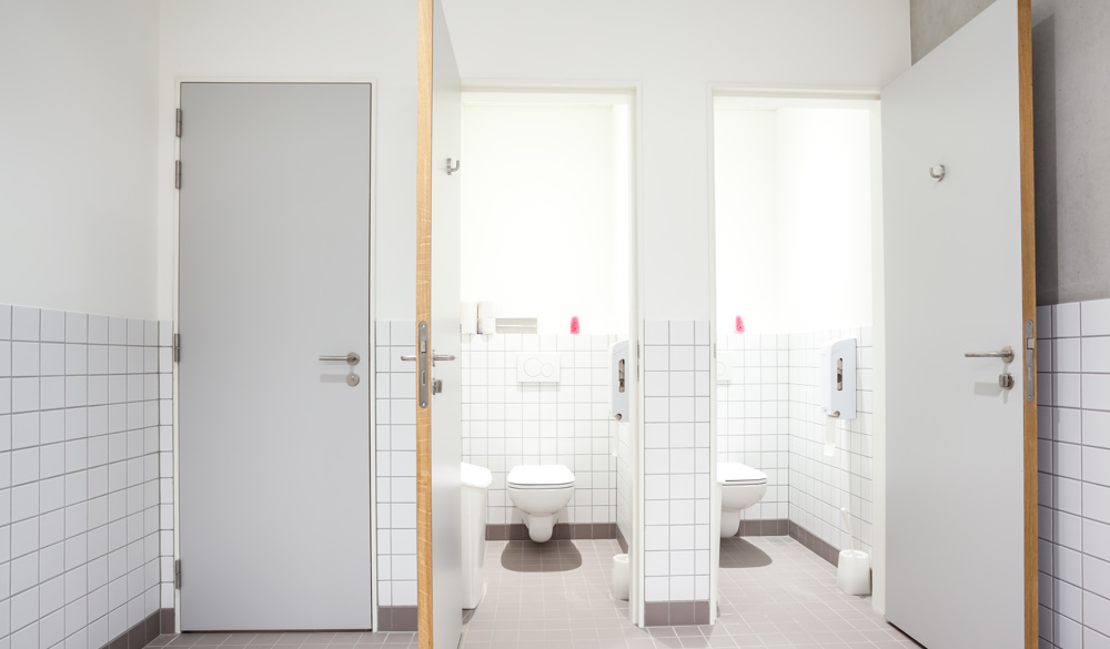 Public washroom facilities showing 3 stalls 