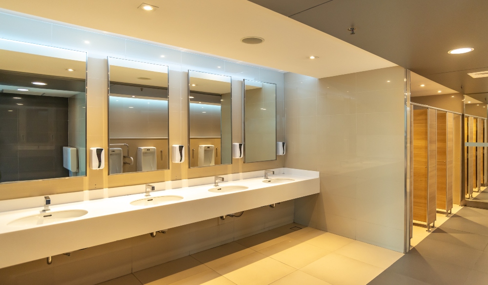 A modern washroom inside of a commercial building. 