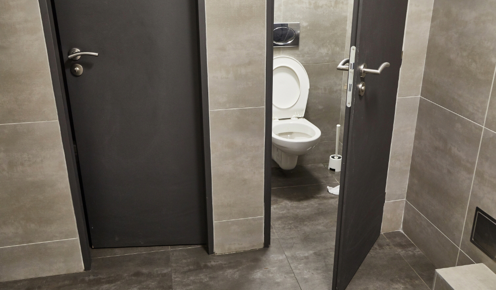 Commercial Washroom facilities showing open toilet door