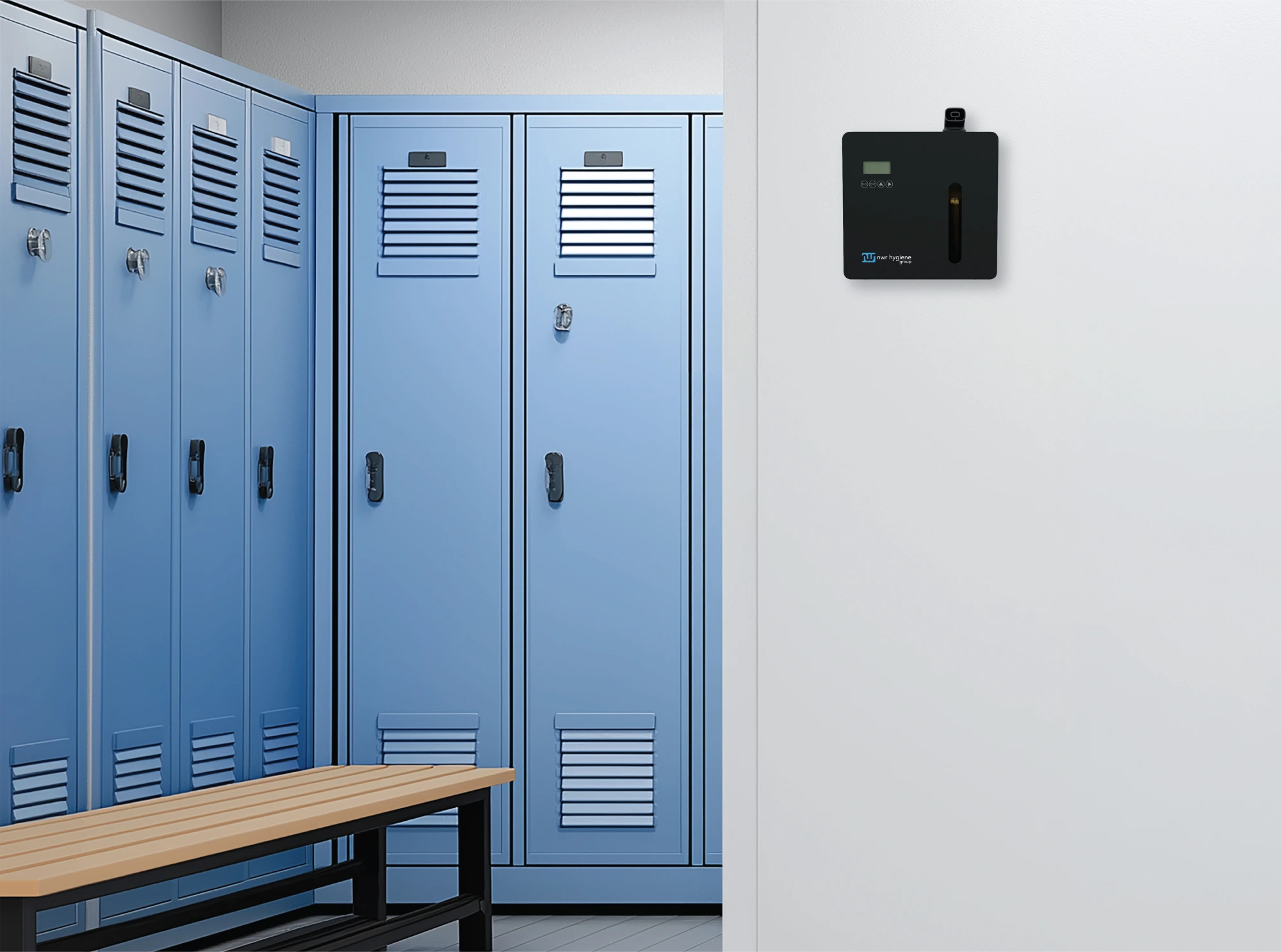 A black NWR Hygiene Group scent dispenser mounted on a white wall in a locker room.