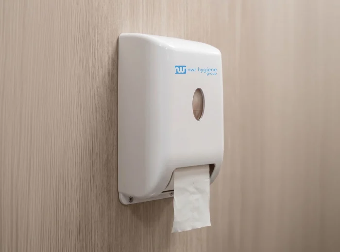 White, single roll, NWR toilet paper dispenser.